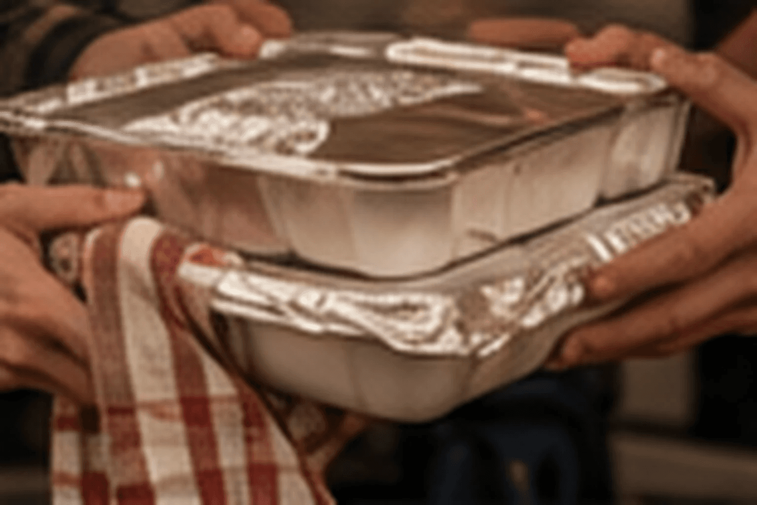 Food being handed off to firefighters